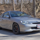 Image for article titled Some Genius Swapped a Honda Civic Si Motor Into a 220,000 Mile Honda Insight Hybrid
